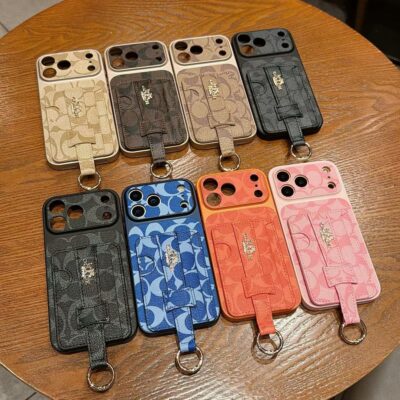 Coach iPhone 17 Pro Max Leather Case with Card Holder & Finger Handle – Luxury Designer Phone Cover for iPhone 13, 14, 15, 16 & 17